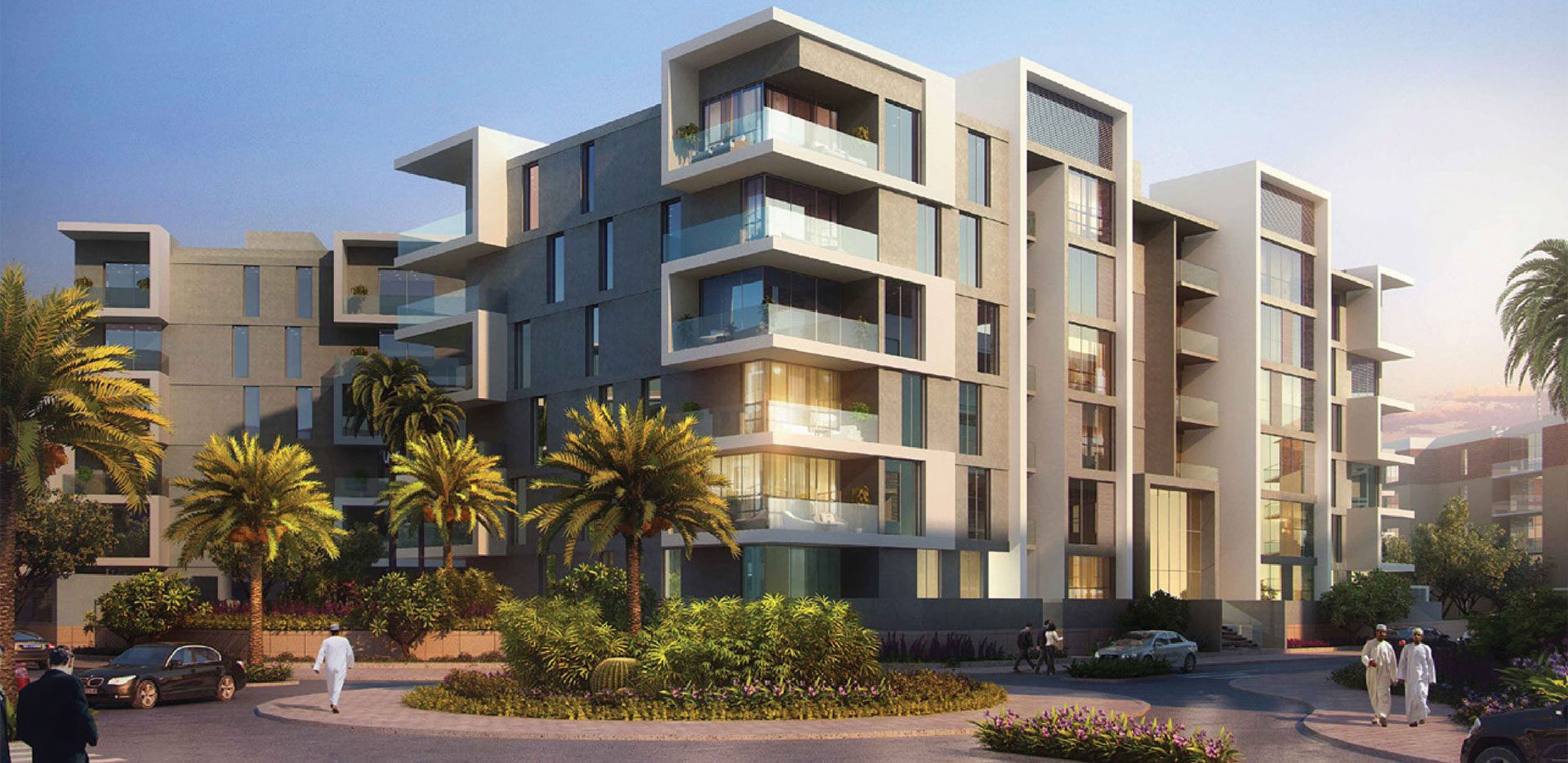 Architect's rendering of a new apartment development at Al Mouj in Seeb: six-storey buildings with glass balconies and date palms around a landscaped roundabout
